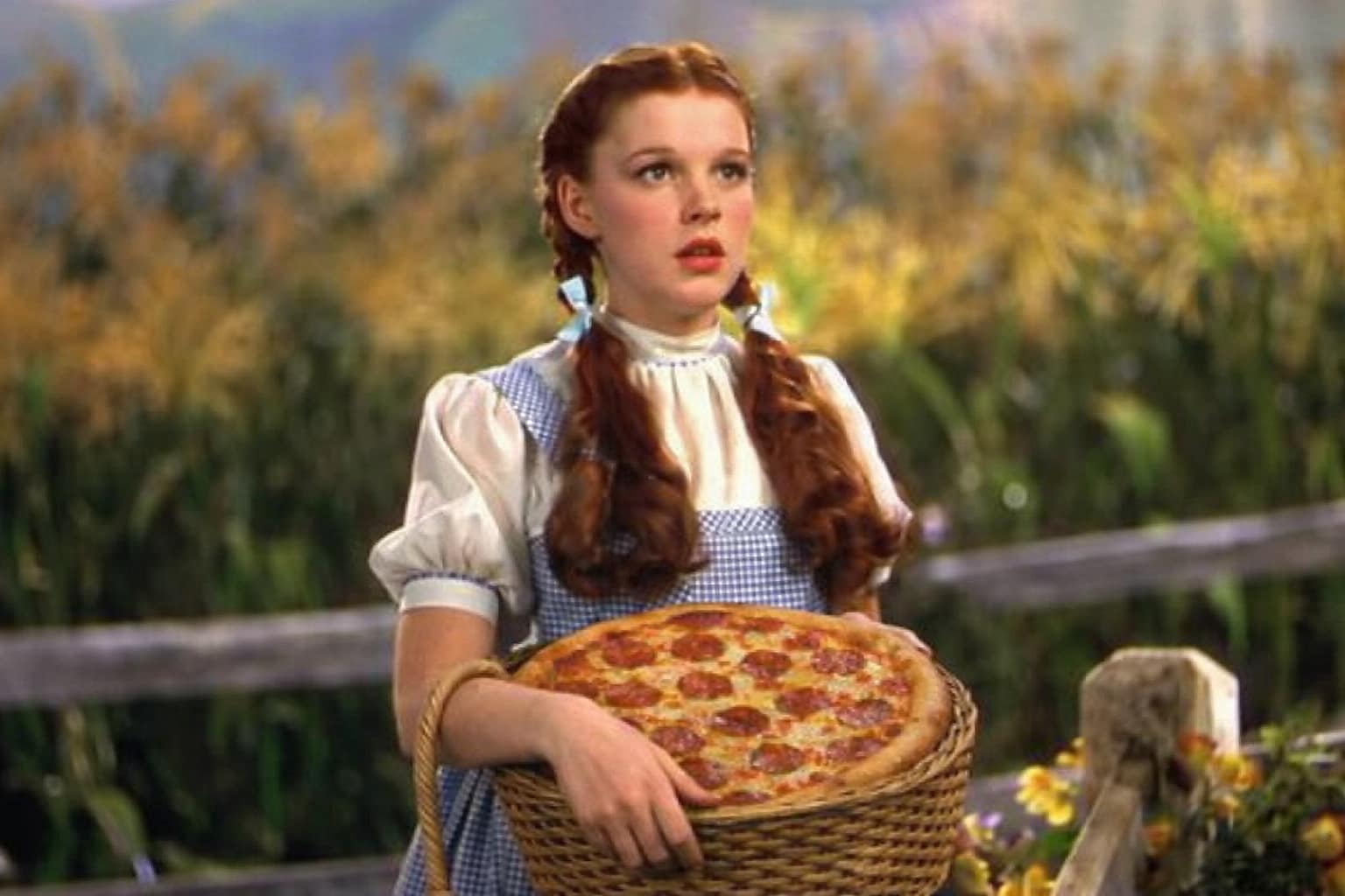Movie-inspired artwork of a girl in a gingham dress holding a pizza basket